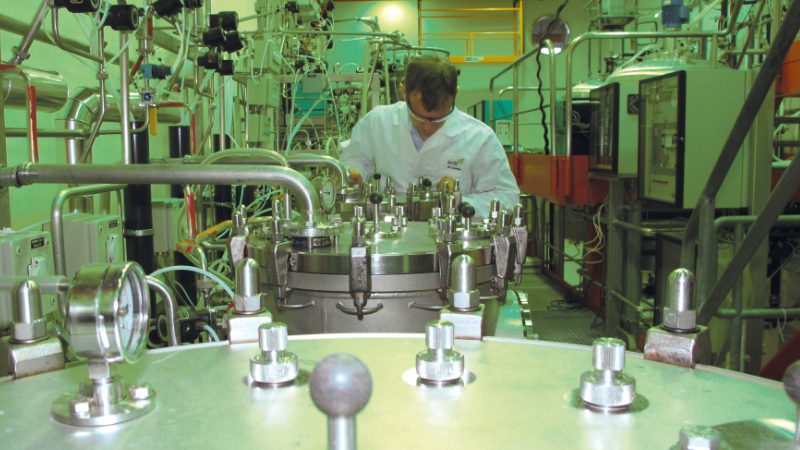 Scientist from acib working on a bioreactor in Vienna.