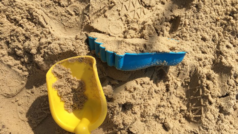 plastic sand toys on the beach